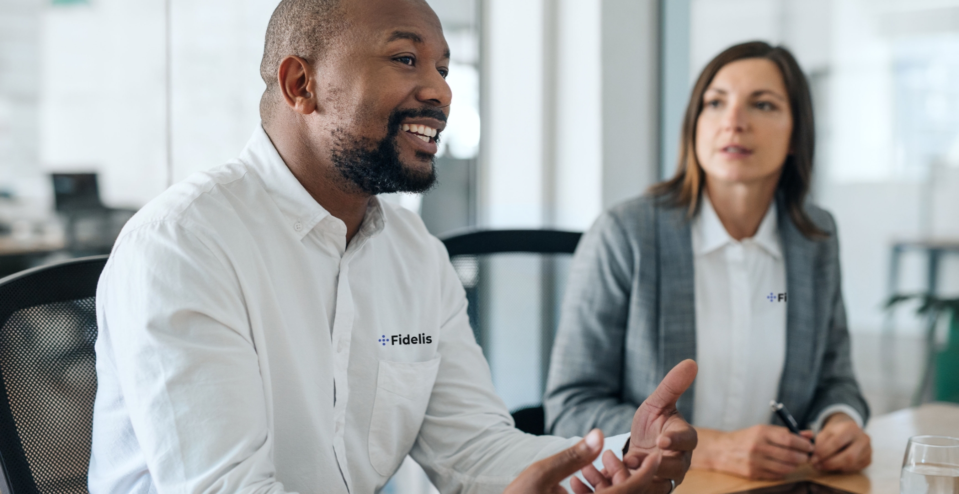 Businessman and businesswoman working together