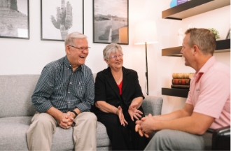 Senior couple in a comfortable conversation with a Fidelis Agent