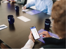 Fidelis employees gathered in the boardroom